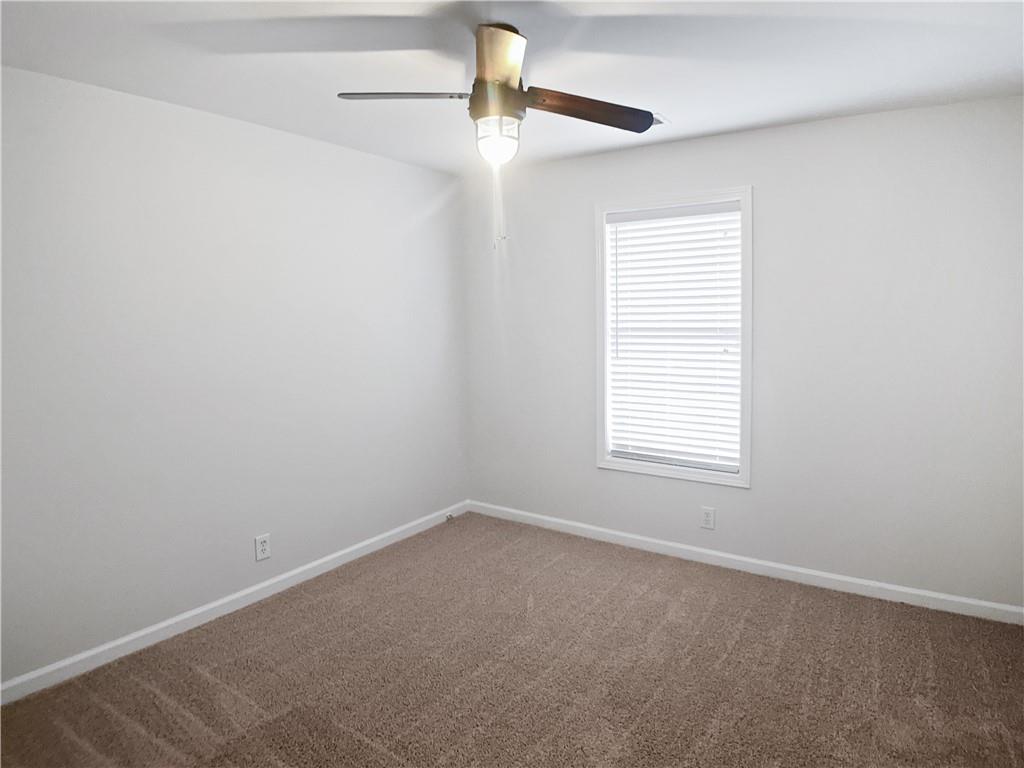 1780 North Round Road Lawrenceville, GA 30045 - Photo 11 of 24 a room that has a window in it