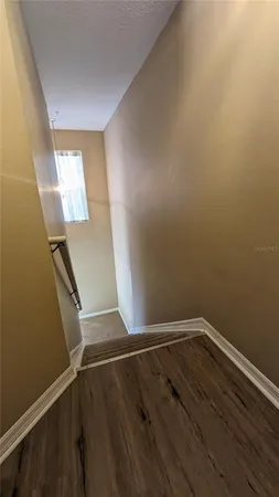 a view of small space with wooden floor