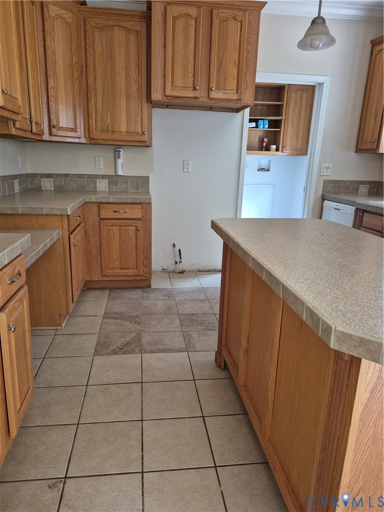 10541 Continental Road Quinton, VA 23141 - Photo 10 of 15 Kitchen featuring wood cabinetry, a central island