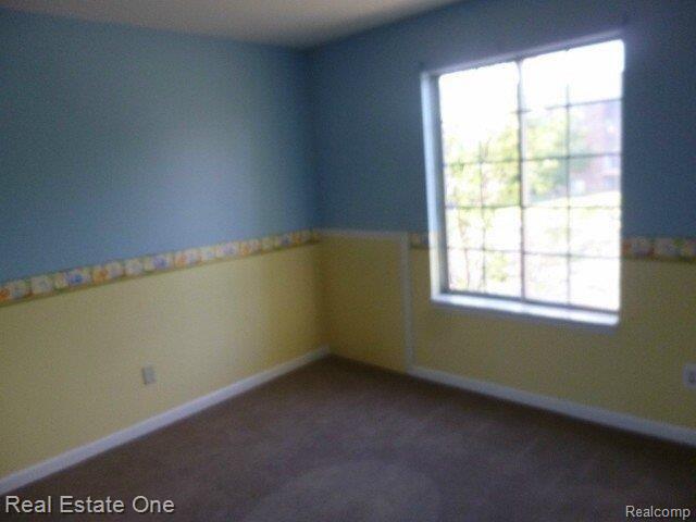 505 West Highland Road, Unit 27 Howell, MI 48843 - Photo 15 of 21 261-854461 Bedroom 2 view 2.jpg
