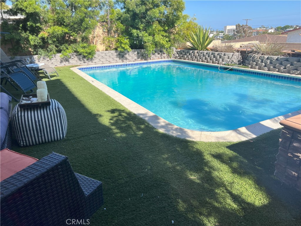 a view of a swimming pool from a balcony