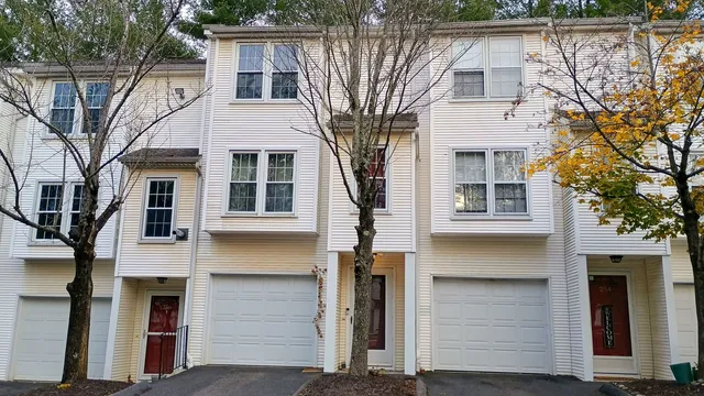 a view of a chairs on the roof deck