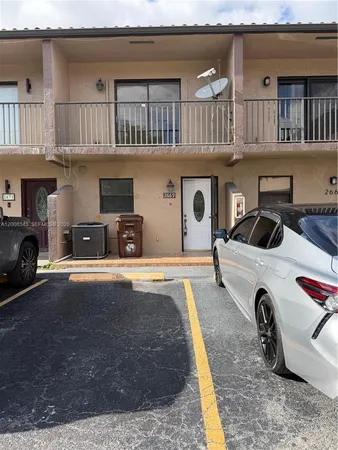 a car parked in front of a building