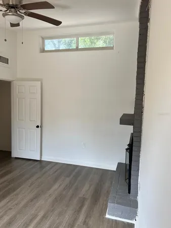 a view of small space with wooden floor