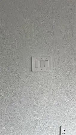 a white wall with white walls