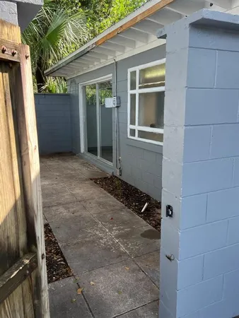 a view of backyard with cabin
