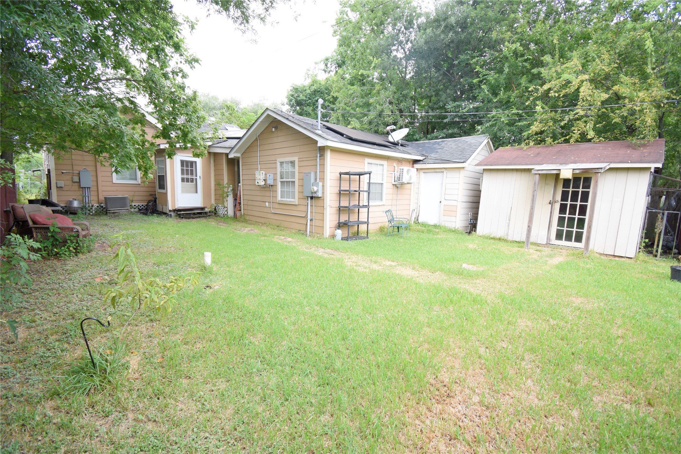 819 Center Street Pasadena, TX 77506 - Photo 3 of 11 a view of a house with a yard and sitting area