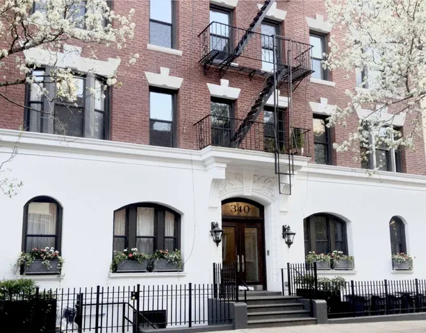 a view of building with glass windows