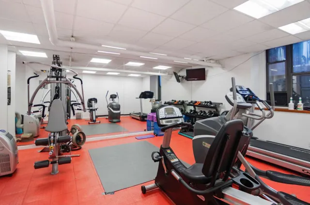 a view of a room with gym equipment