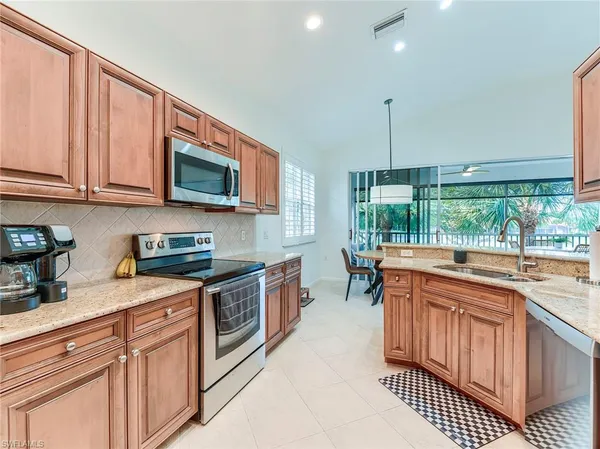 $499,900 | 10452 Autumn Breeze Drive, Unit 201, Estero, FL 34135