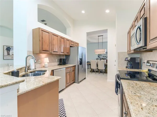 $499,900 | 10452 Autumn Breeze Drive, Unit 201, Estero, FL 34135