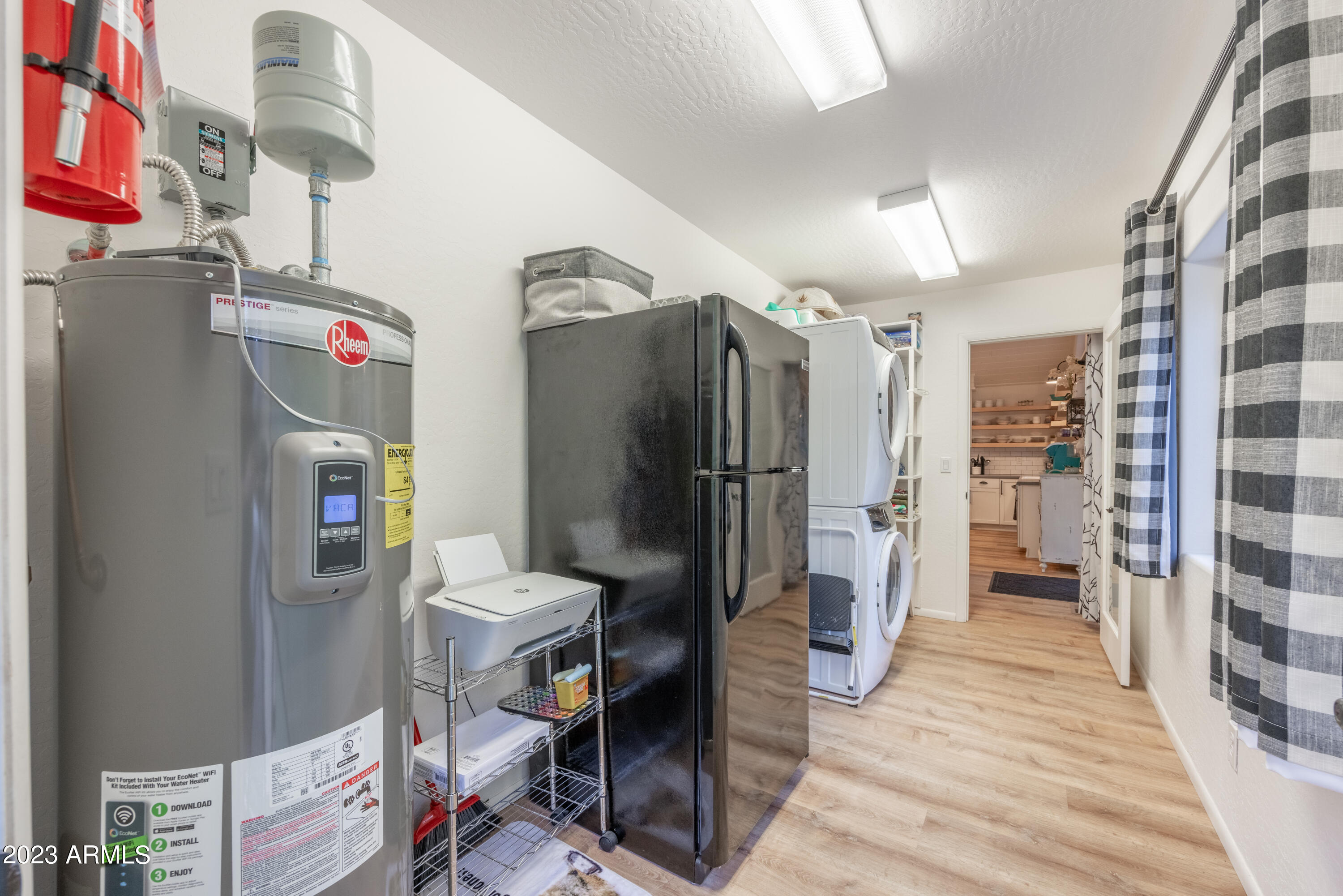 2772 Larson Loop Forest Lakes, AZ 85931 - Photo 25 of 65 a utility room with dryer and washer