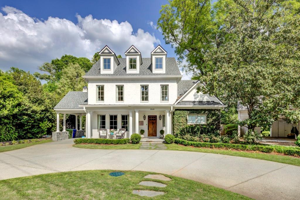 3545 Habersham Road Northwest Atlanta, GA 30305 - Photo 1 of 1 front view of a house with a yard
