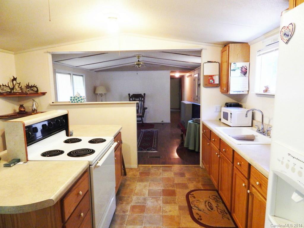 1830 Reservation Road Rock Hill, SC 29730 - Photo 12 of 24 a kitchen with a sink stove and refrigerator