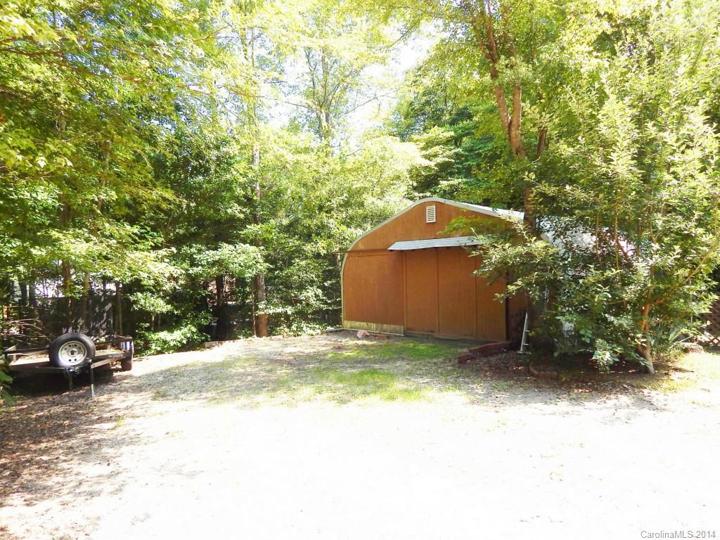 1830 Reservation Road Rock Hill, SC 29730 - Photo 21 of 24 a backyard of a house with cars parked on road