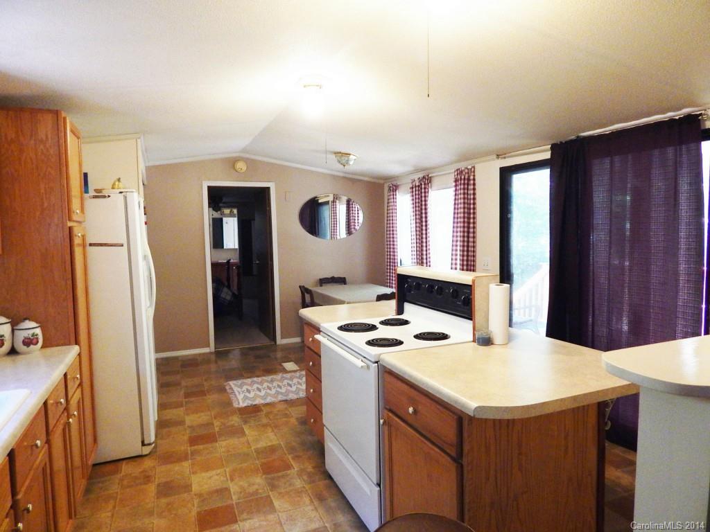 1830 Reservation Road Rock Hill, SC 29730 - Photo 4 of 24 a kitchen that has a sink and a stove in it