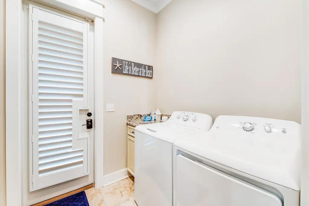 142 Matt's Way Santa Rosa Beach, FL 32459 - Photo 13 of 32 a utility room with dryer and washer