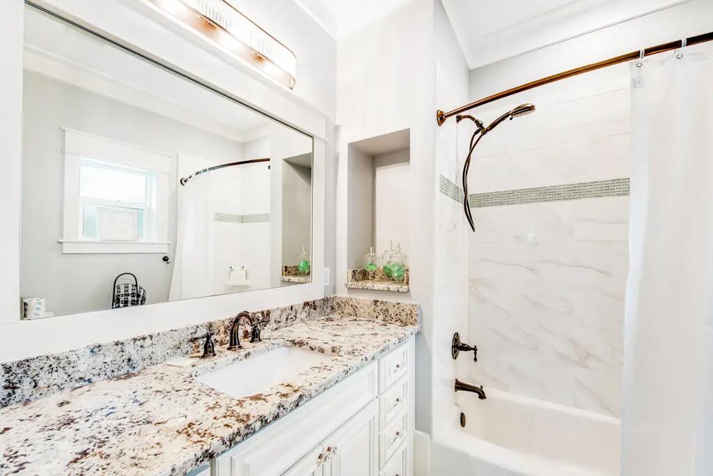 142 Matt's Way Santa Rosa Beach, FL 32459 - Photo 25 of 32 a bathroom with a bathtub and a sink