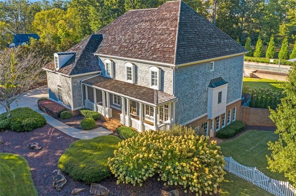 900 Crabapple Hill Alpharetta, GA 30004 - Photo 12 of 72 front view of a house with a yard