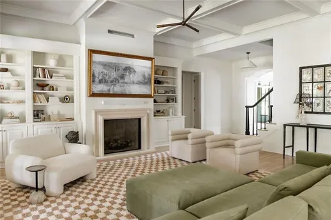 a kitchen with a table and chairs in it
