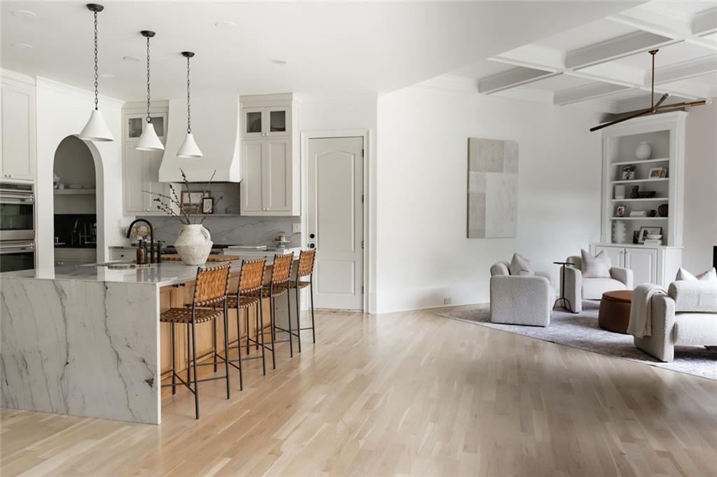 900 Crabapple Hill Alpharetta, GA 30004 - Photo 41 of 72 a living room with furniture and a wooden floor