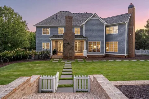 an aerial view of a house with swimming pool