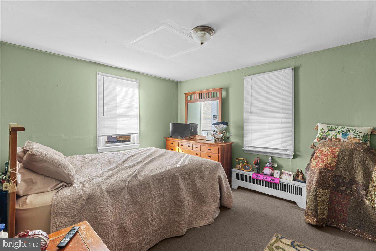 94 East Browning Road Bellmawr, NJ 08031 - Photo 15 of 39 a bedroom with a bed and a window