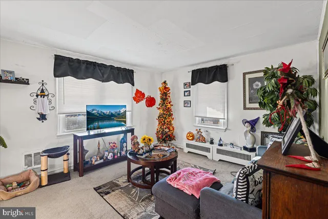 a white refrigerator freezer sitting inside of a kitchen