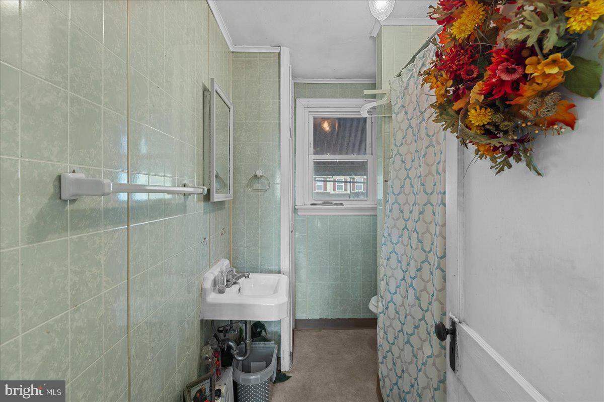 94 East Browning Road Bellmawr, NJ 08031 - Photo 18 of 39 a bathroom with a shower