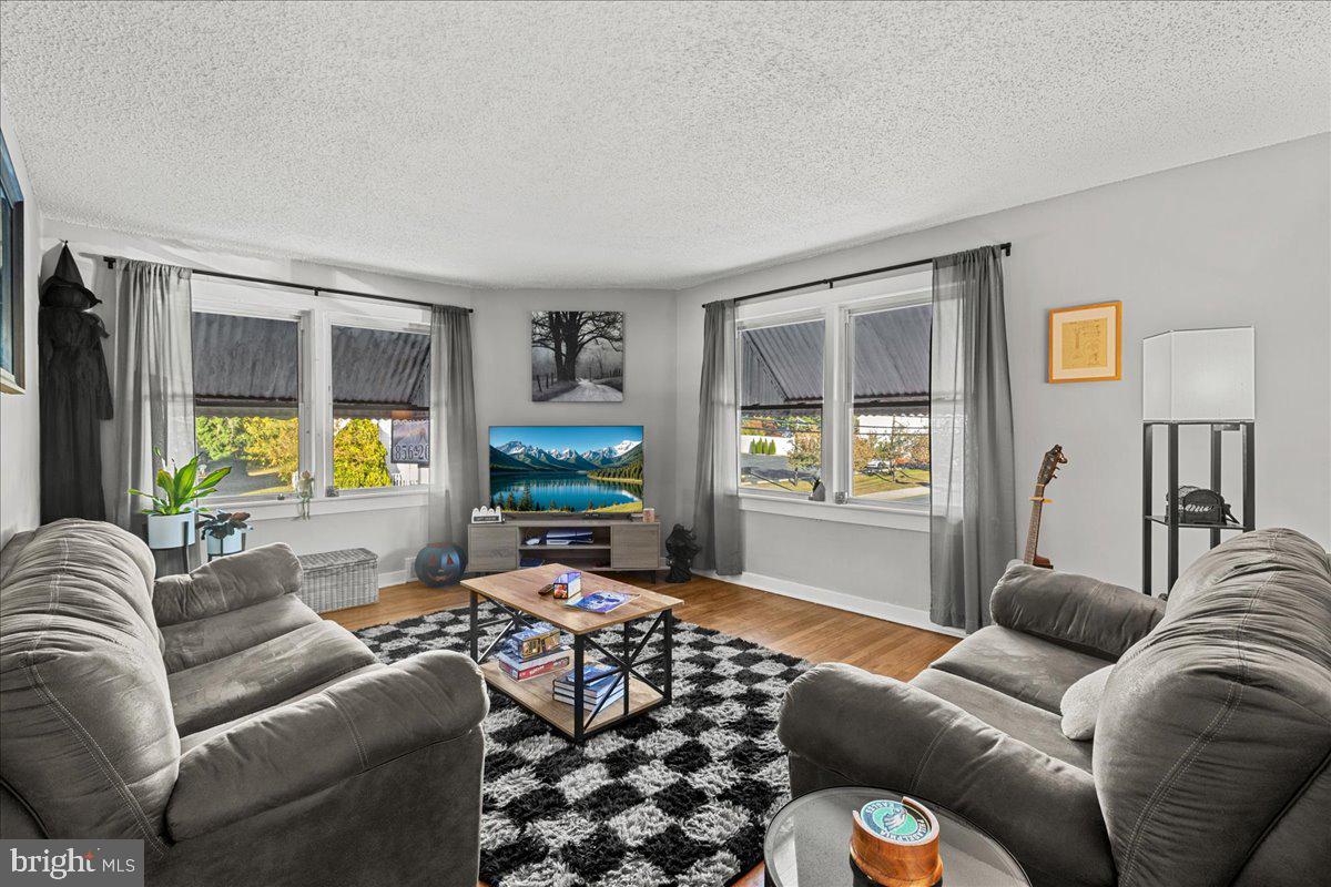 94 East Browning Road Bellmawr, NJ 08031 - Photo 31 of 39 a living room with furniture and a window