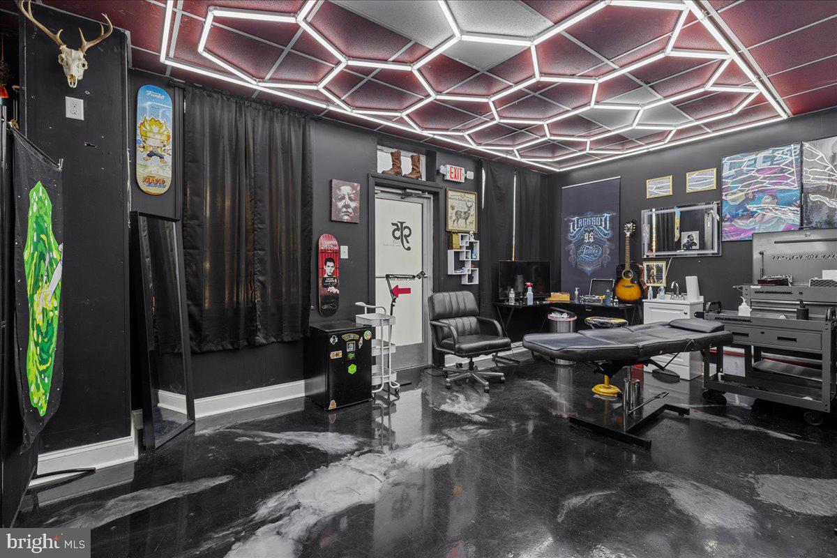 94 East Browning Road Bellmawr, NJ 08031 - Photo 35 of 39 a living room with lots of furniture and a chandelier