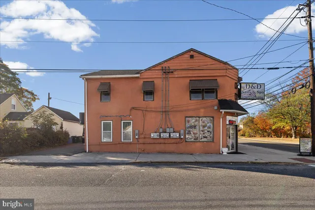 a view of a car park in front of house