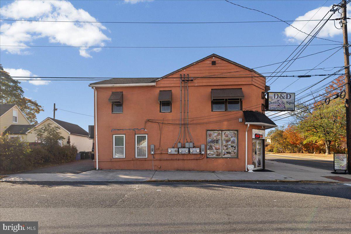 94 East Browning Road Bellmawr, NJ 08031 - Photo 4 of 39 a view of a house with a street