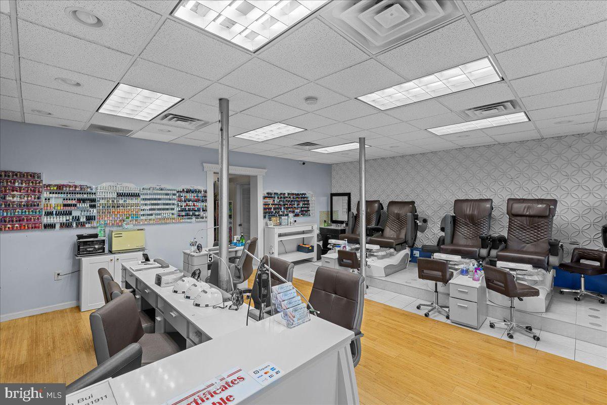 94 East Browning Road Bellmawr, NJ 08031 - Photo 7 of 39 a view of a kitchen with kitchen island stainless steel appliances refrigerator stove and chairs