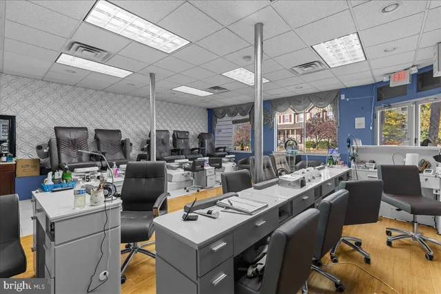 a room with gym equipment and window