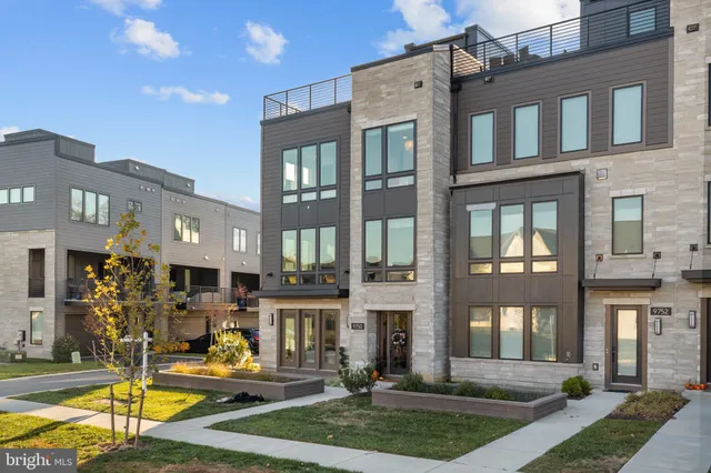 a swimming pool with outdoor seating