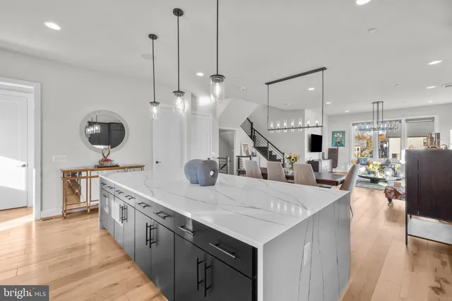 a view of walk in closet with clothes