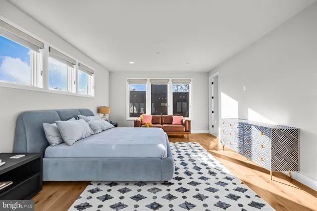 a view of a patio with table and chairs and potted plants