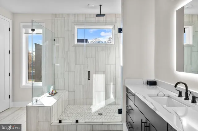 a living room with lots of furniture and a flat screen tv