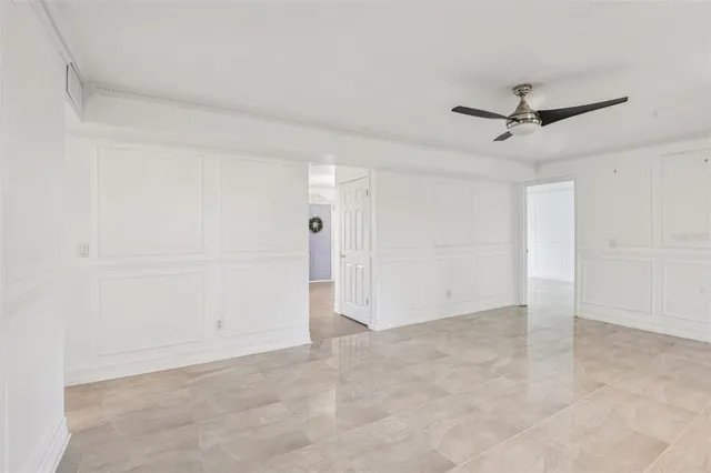 a spacious bathroom with a sink a washer and dryer