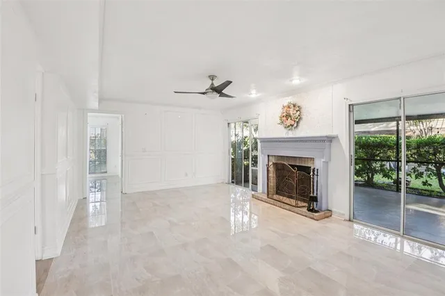 a kitchen with a refrigerator a sink and dishwasher a oven with wooden floor