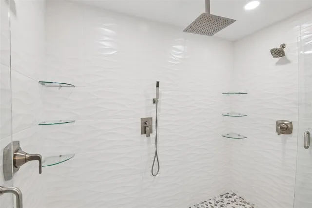 a view of walk in closet with window