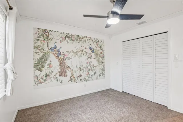 a front view of house with a garden