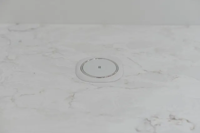 a view of kitchen with white cabinets