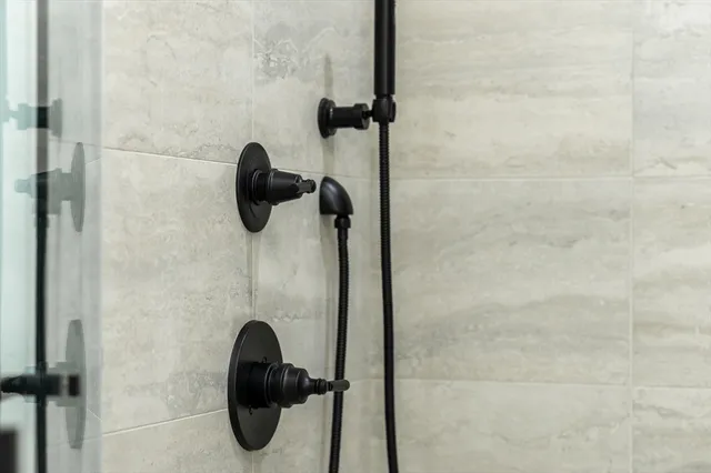 a close view of a bathtub in the bathroom