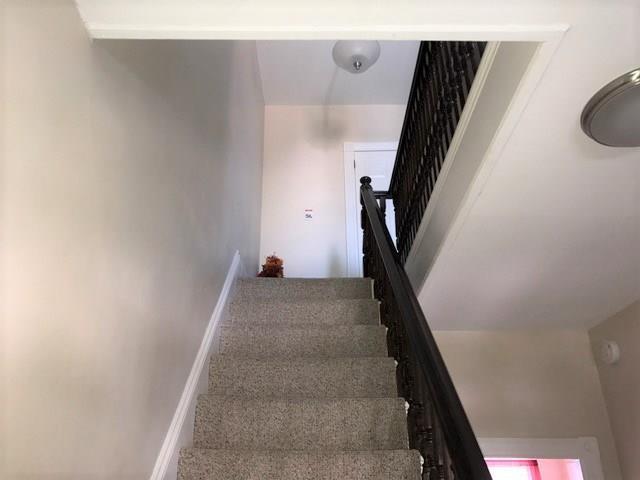 160 Middle Street Bath, ME 04530 - Photo 13 of 18 Carpeted stairs take you up to the...