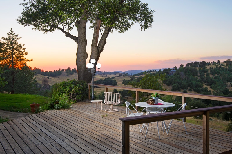 2466 Wynola Road Julian, CA 92036 - Photo 11 of 25 Fully lit deck area with orchard views.