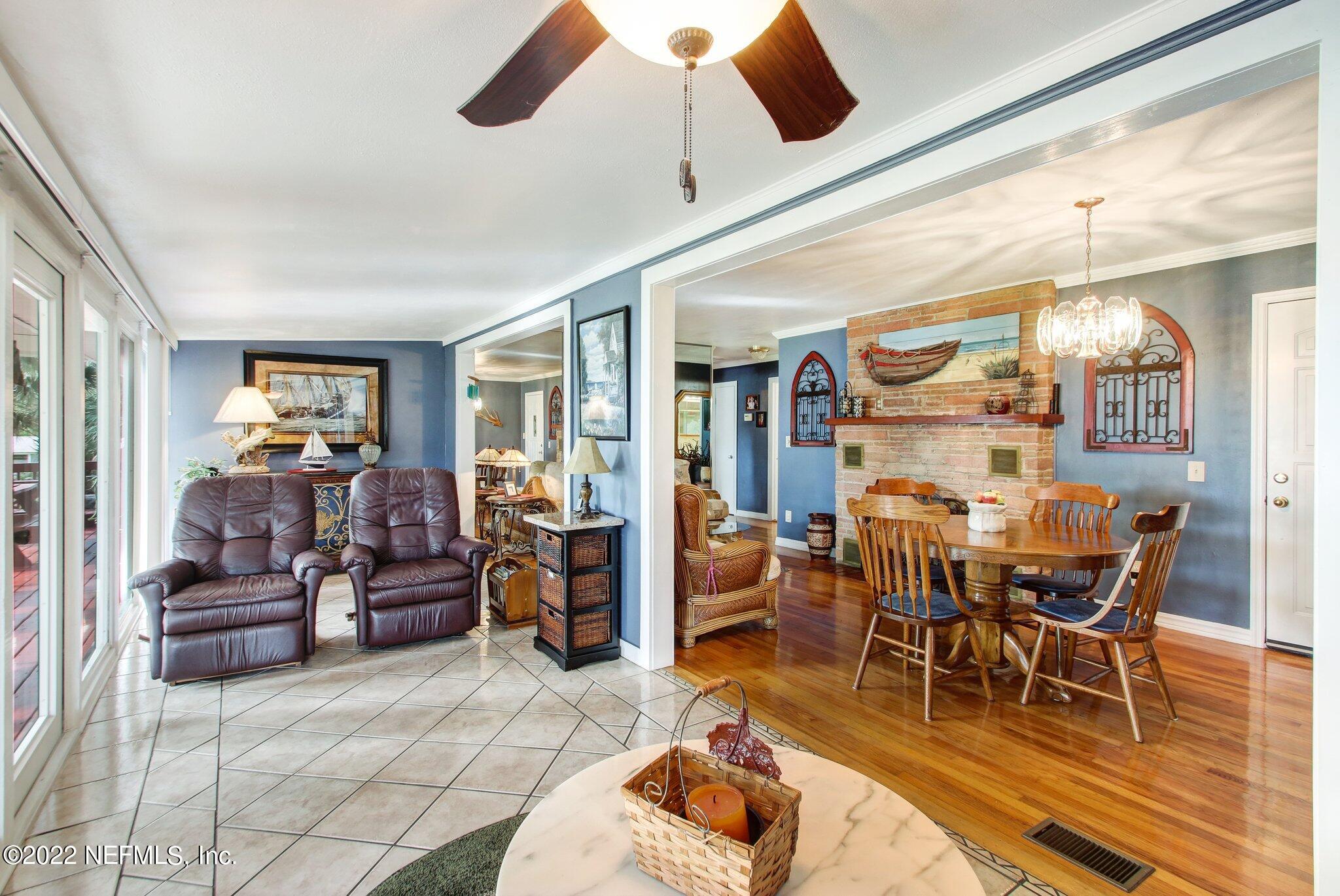 101 Orange Street Satsuma, FL 32189 - Photo 11 of 67 a living room with lots of furniture and white walls