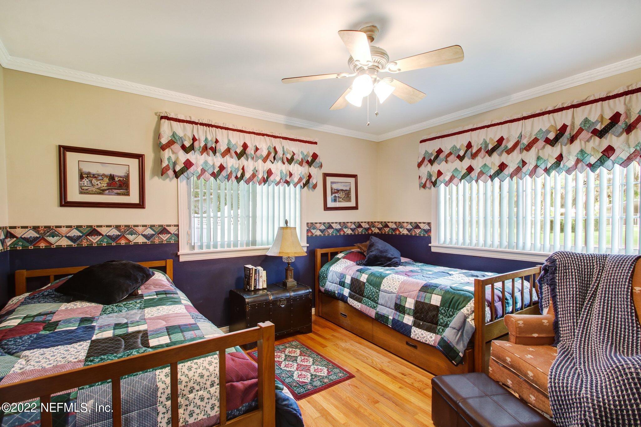 101 Orange Street Satsuma, FL 32189 - Photo 25 of 67 a bedroom with furniture and a window