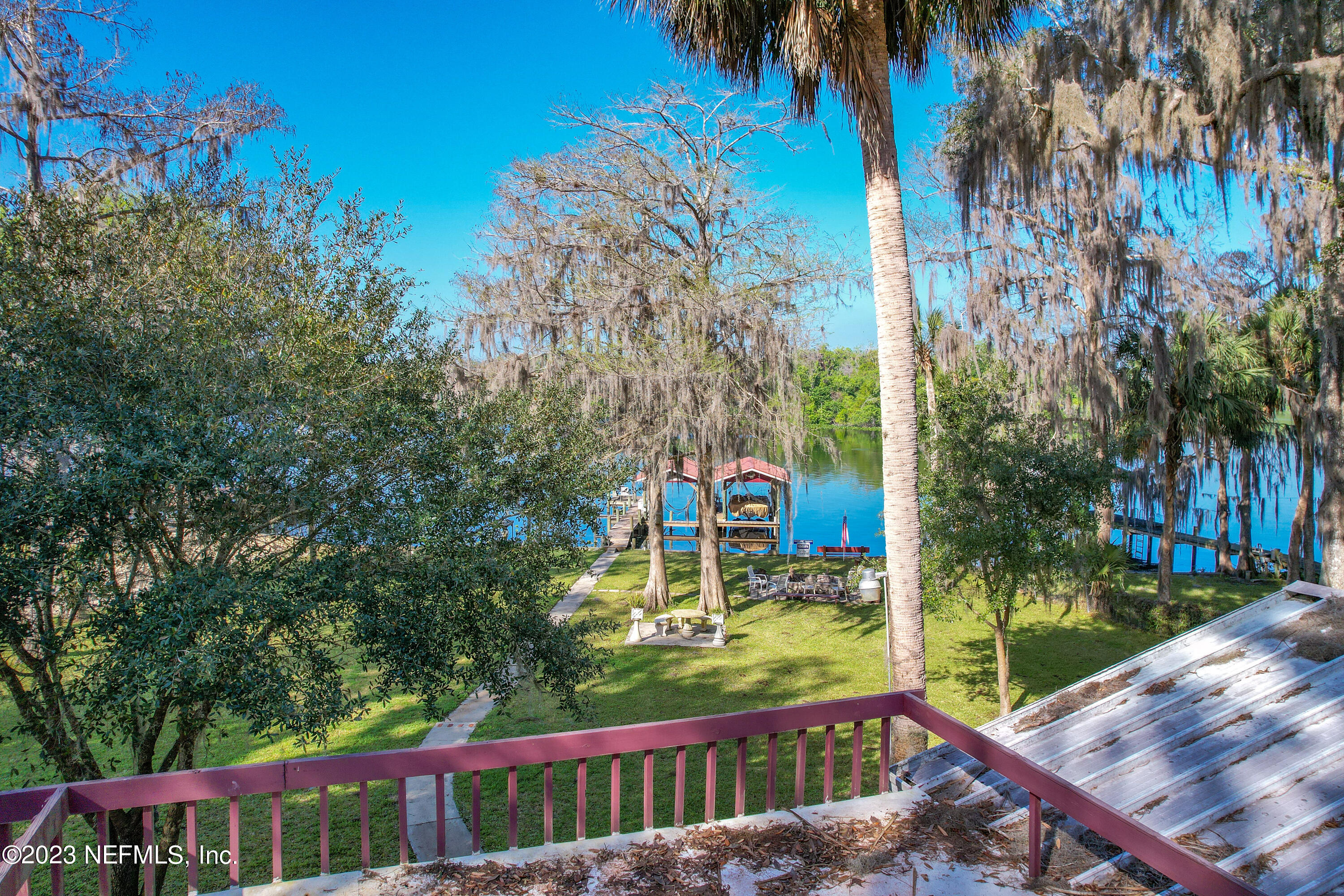 101 Orange Street Satsuma, FL 32189 - Photo 28 of 67 a view of a two chairs on the deck